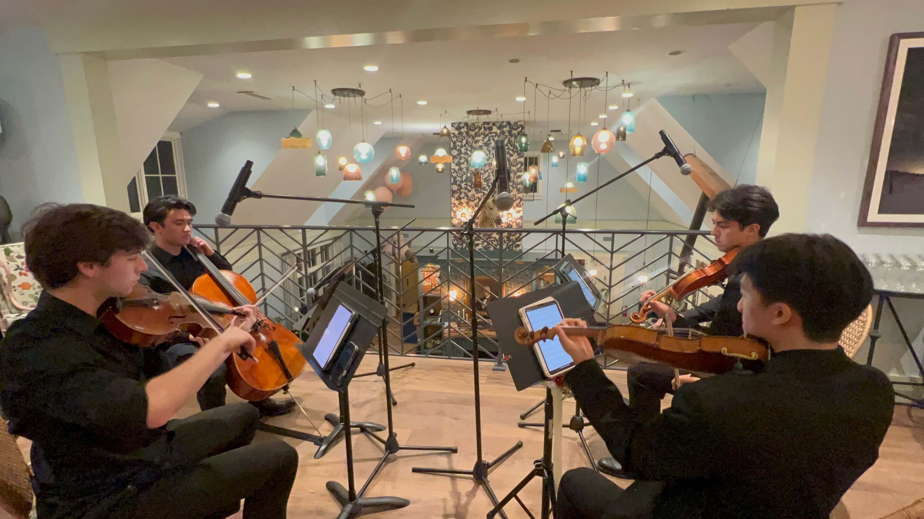 Moon River Quartet performing on a balcony